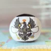 Prussia Countryball plushie, side view